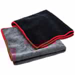 Thick stack of cotton towels in different colors