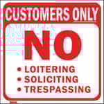 Red and White No Loitering Sign
