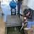 portable industrial vacuum installed on a wheelbarrow